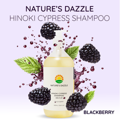 Nature's Dazzle Hinoki Cypress Shampoo bottle with blackberries and leaves on a light purple background