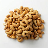 A pile of premium Herb & Honey unsalted roasted cashews on a white background.