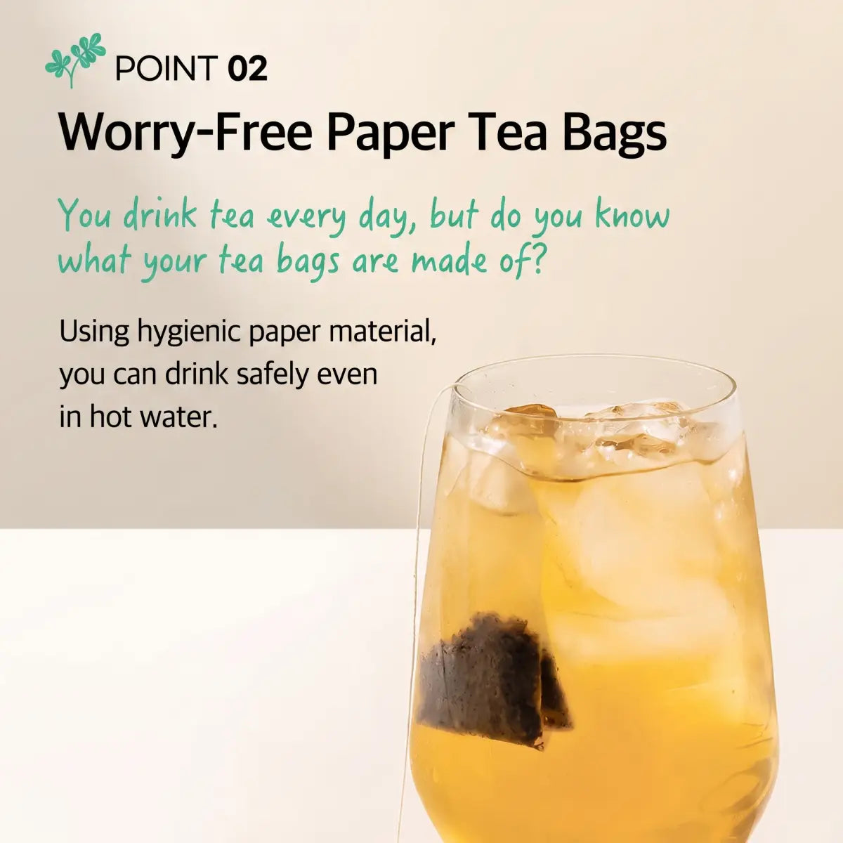 Paper tea bag of marigold cassia seed tea steeping in a glass of iced tea