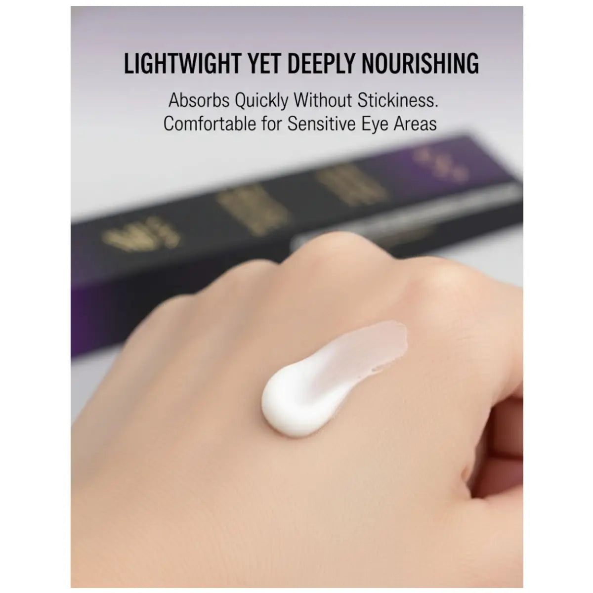 Hand applying a small amount of cream to the skin with product packaging in the background.