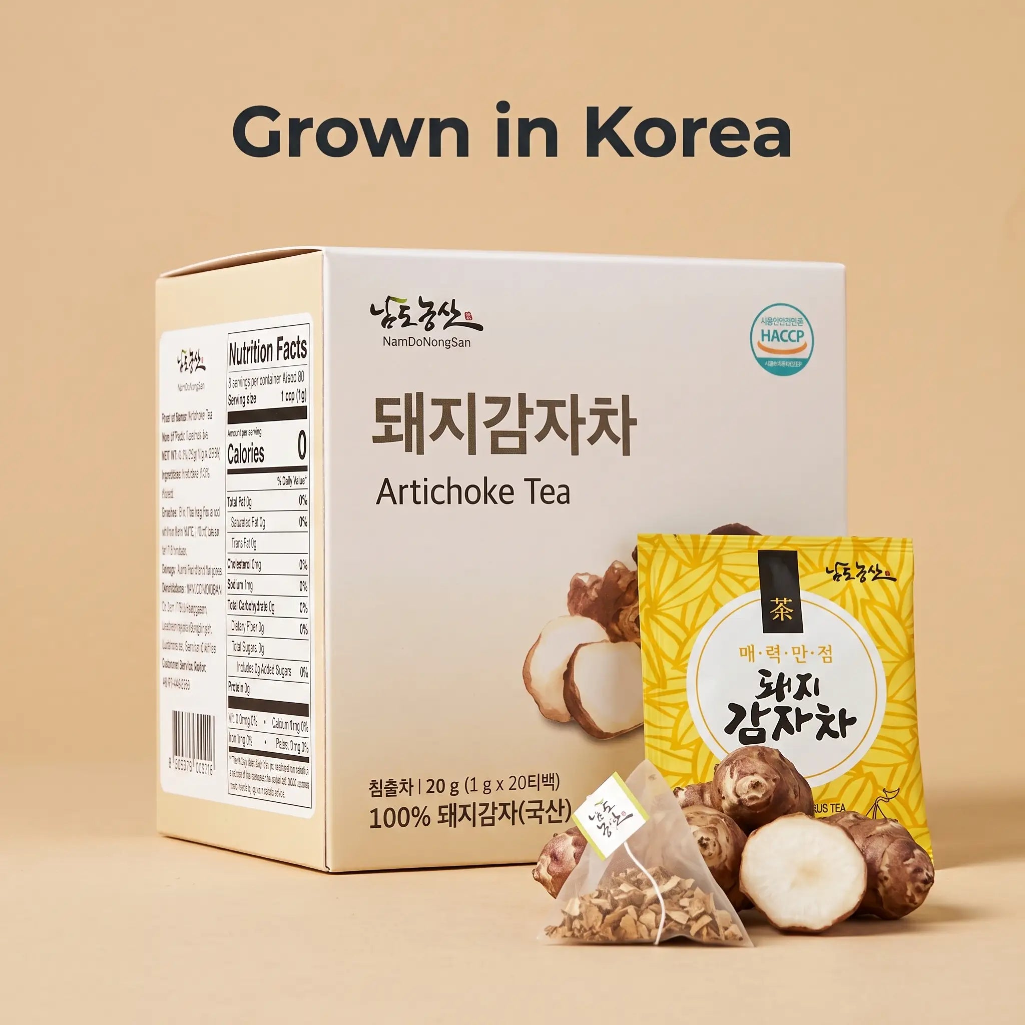 Namdo Nongsan Korean Jerusalem artichoke (sunchoke) tea box with pyramid tea bag and fresh sunchoke tubers