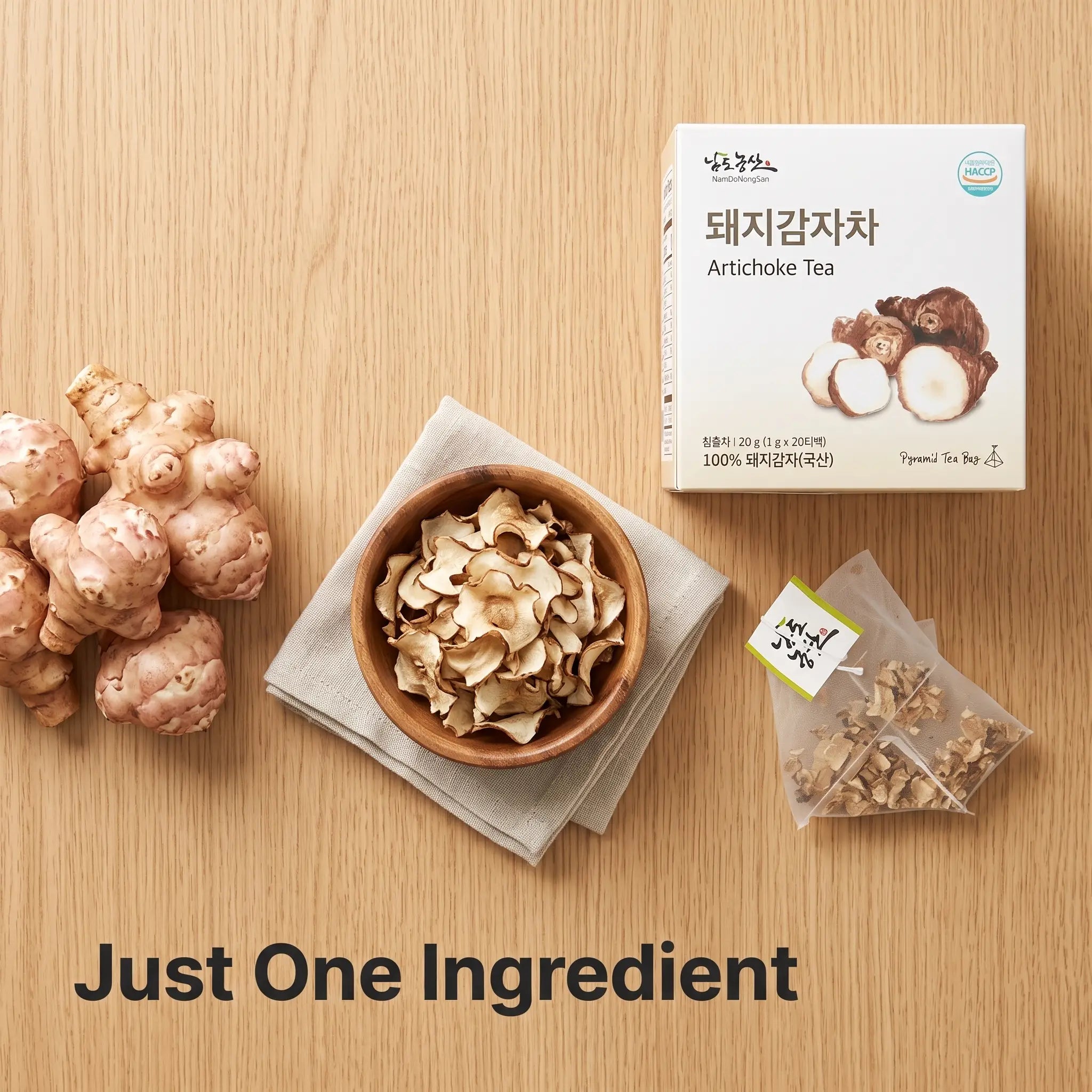 Fresh sunchokes, dried Jerusalem artichoke chips, and a pyramid tea bag showing the single-ingredient process