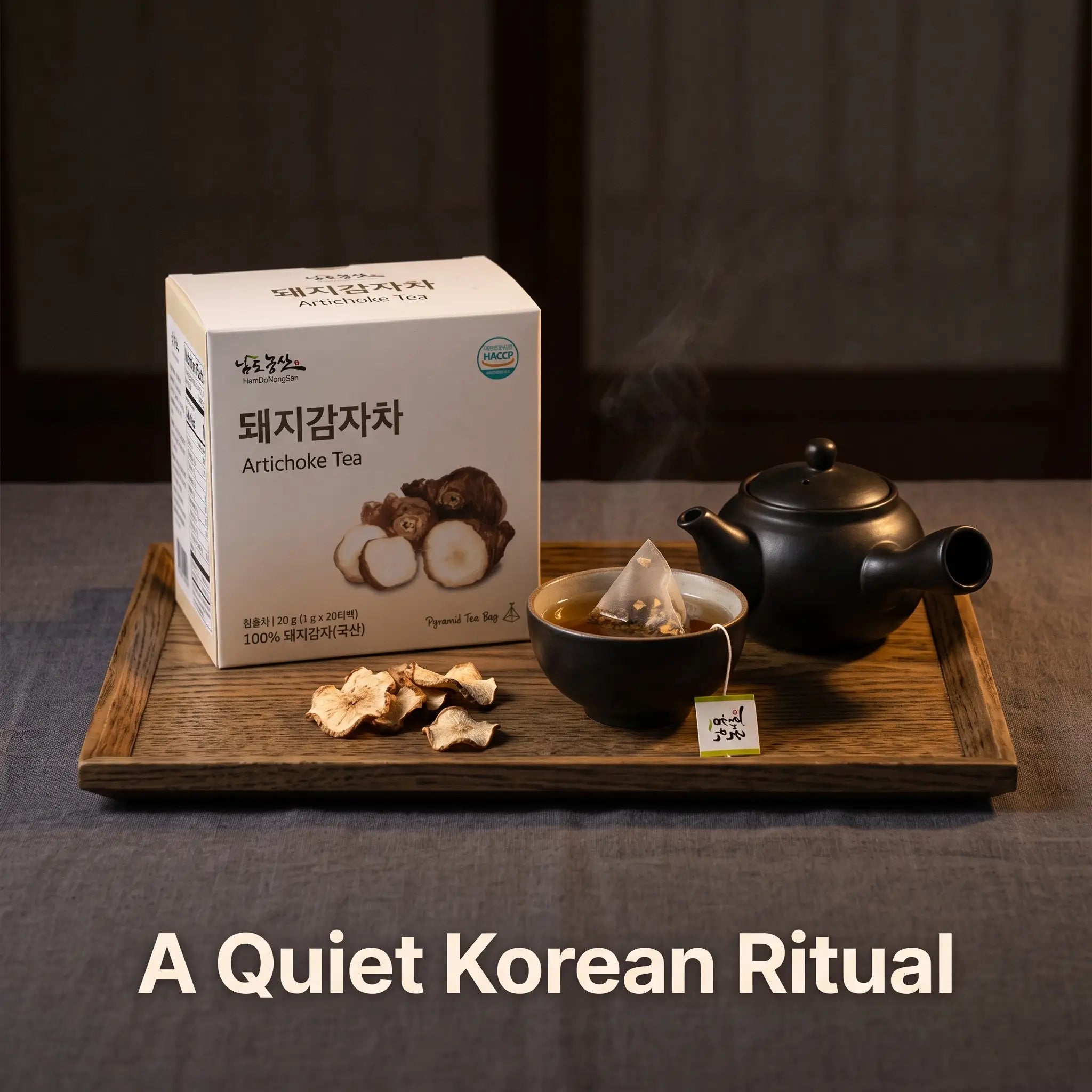 Korean sunchoke tea steeping in a ceramic cup on a wooden tray, calm evening setting
