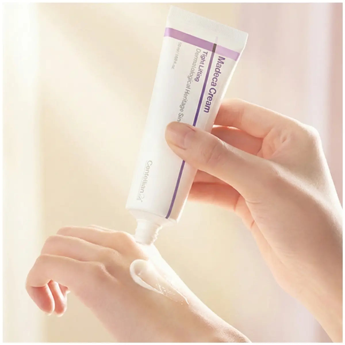 Close-up of the bouncy Centella (Cica) firming cream texture, a nourishing Korean moisturizer.
