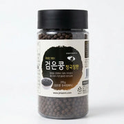 Jar of black beans with a black lid on a white background