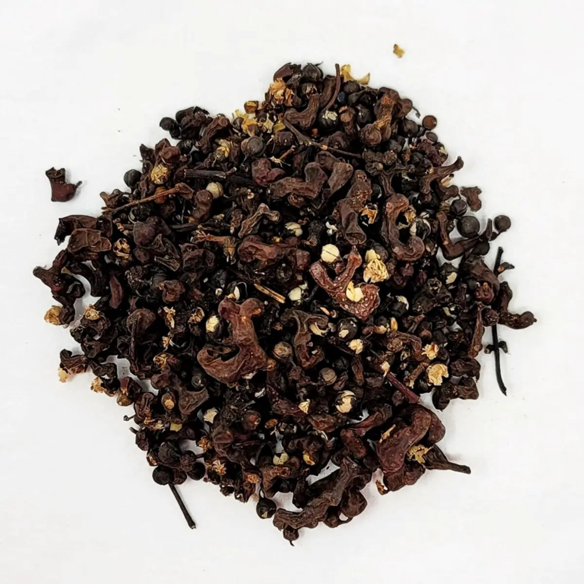 Detail of whole dried Korean Hovenia Dulcis fruit, showcasing the natural texture of premium herbal tea ingredients for holistic wellness.