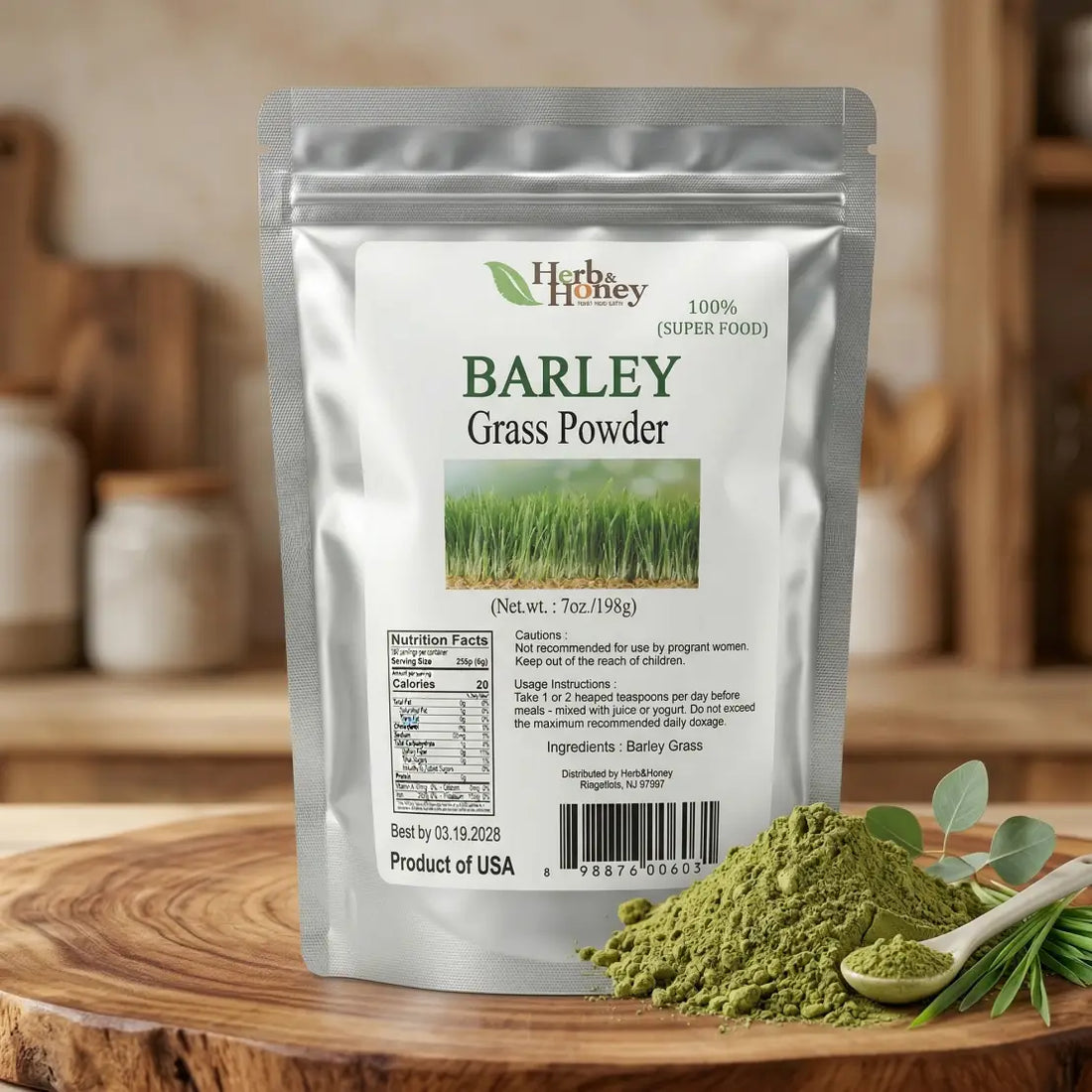 Herb & Honey Barley Grass Powder 7oz pouch showing nutrition facts and ingredients, displayed on a wooden surface with a spoonful of green powder and fresh leaves.