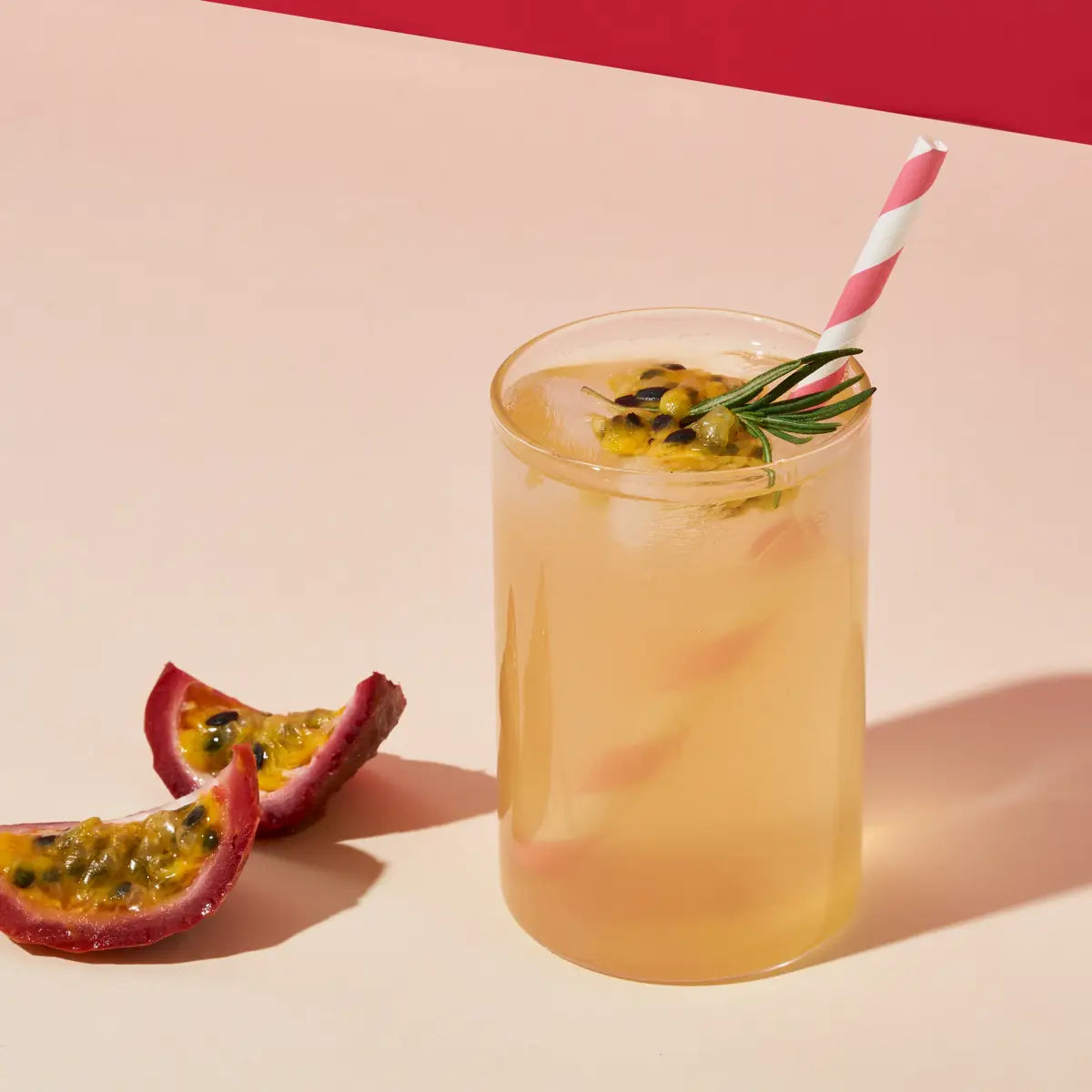 Danongwon Daily Kombucha Passion Fruit tea sticks, refreshing tropical flavor, served iced in a clear glass.