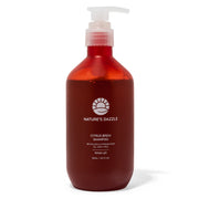 Front view of Nature’s Dazzle Citrus Brew Shampoo bottle, 16.9 oz, featuring vibrant citrus-themed label design
