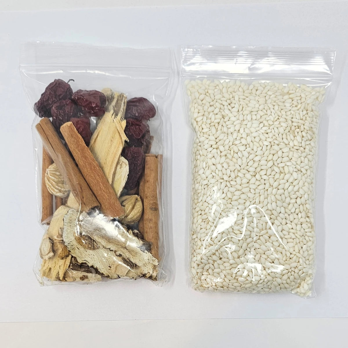 Premium dried Korean herbs, sweet rice, and chestnuts included inside the Kosbee Sam Gye Tang chicken soup kit.