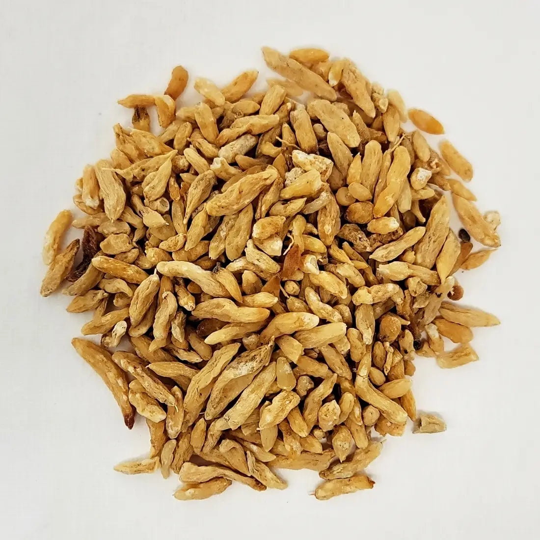 Natural dried slices of premium Korean Liriope root, also known as Maekmundong, showcasing high-quality traditional herbal tea ingredients.
