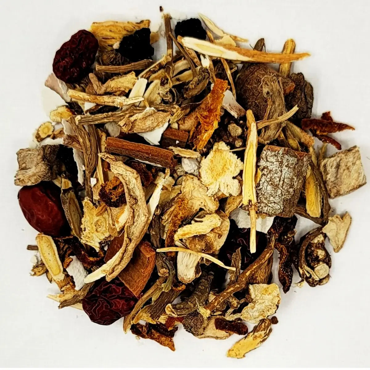 Detailed view of loose dried herbs and roots in Sipjeondaebo-tang traditional Korean tea blend